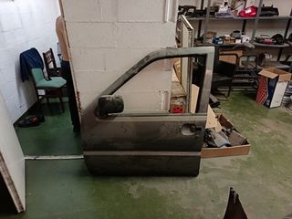 Puerta Nissan Terrano II izquierda