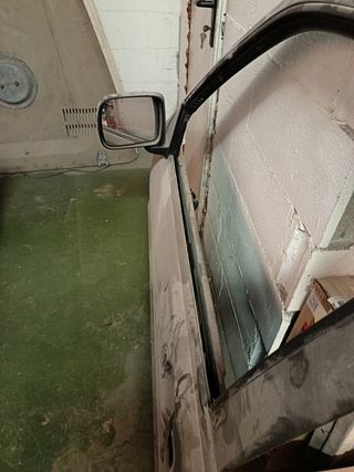 Puerta Nissan Terrano II izquierda
