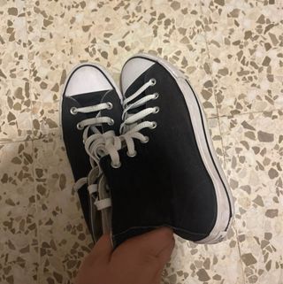 Converse Chuck Taylor negras altas