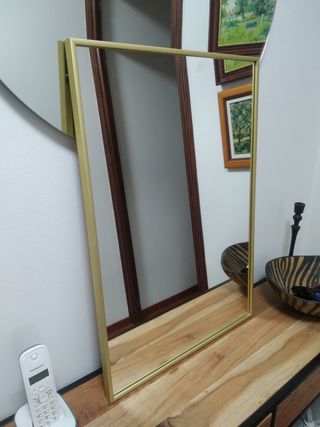 Espejo dorado 66x45cm.