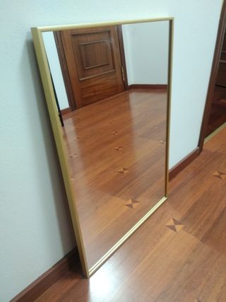 Espejo dorado 66x45cm.