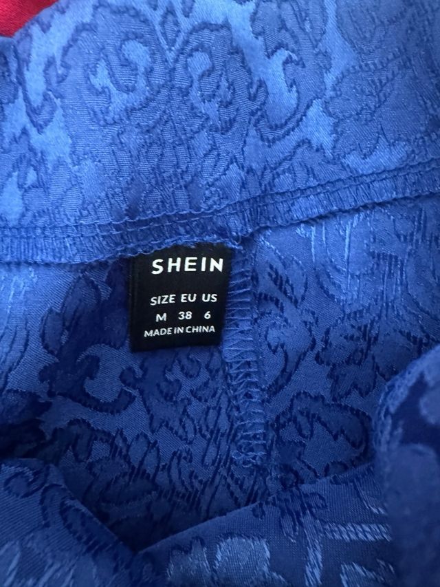 Mini falda azul con flecos Shein