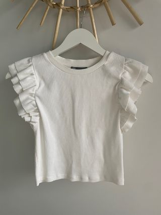 Crop top Zara blanco con volantes