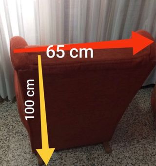 Mecedora  naranja de tela y madera