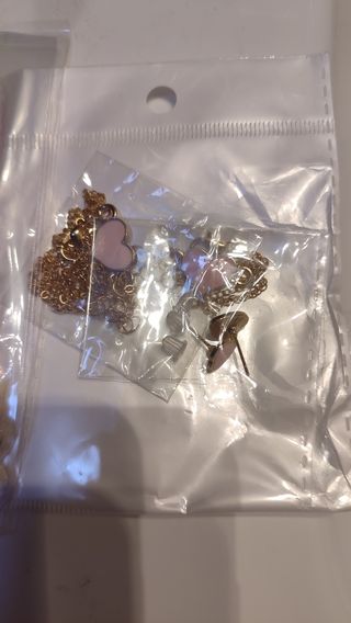 Reloj, pendientes, pulsera y collar rosa
