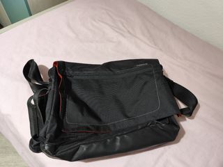 Bandolera newfell negra, interior naranja.