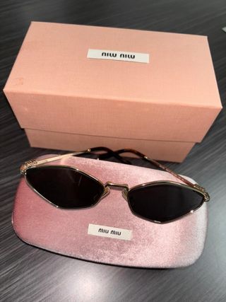 Occhiali Miu Miu dorati