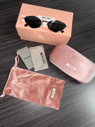 Occhiali Miu Miu dorati