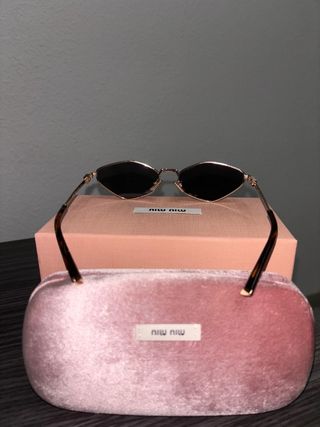 Occhiali Miu Miu dorati