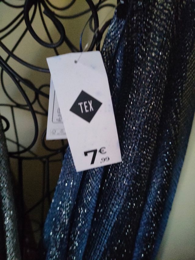 Chal dorado con flecos