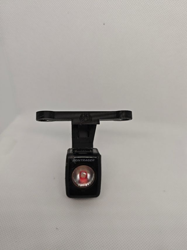 Soporte integrado sillín SWAT + funda luz FLARE