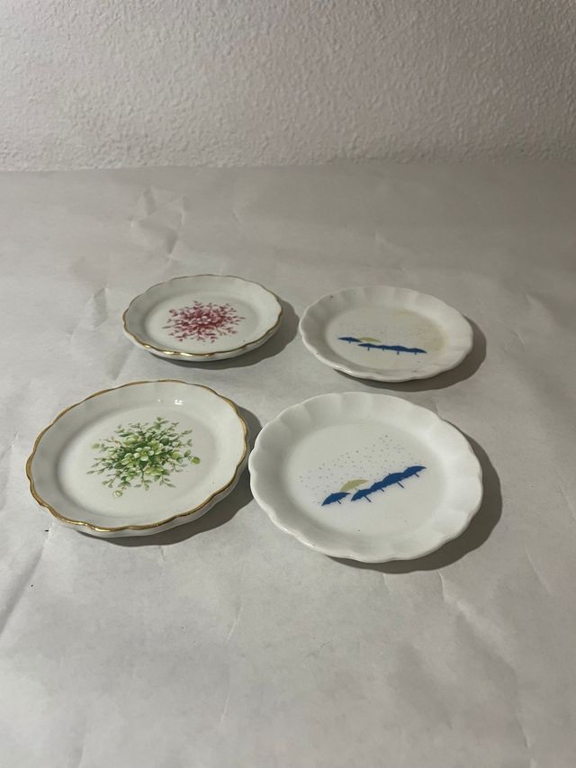 4 piatti in porcellana decorata