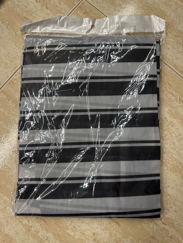 Capa peluquería rayas blancas y negras