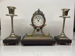 Orologio e candelieri vintage