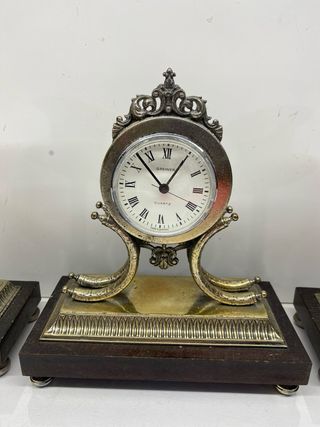 Orologio e candelieri vintage