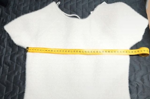 Jersey pelo con espalda descubierta. Zara.