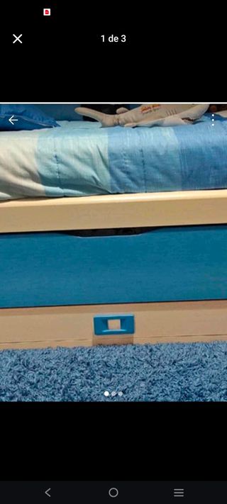 Cama nido azul y blanca