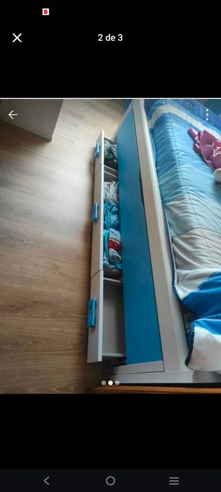 Cama nido azul y blanca