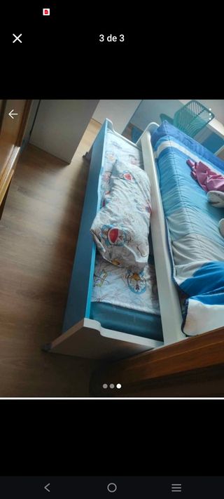 Cama nido azul y blanca