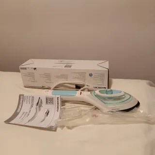 Vendo maleta y regalo una  plancha para viajes