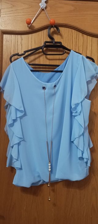 Blusa celeste sin usar