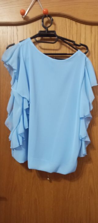 Blusa celeste sin usar