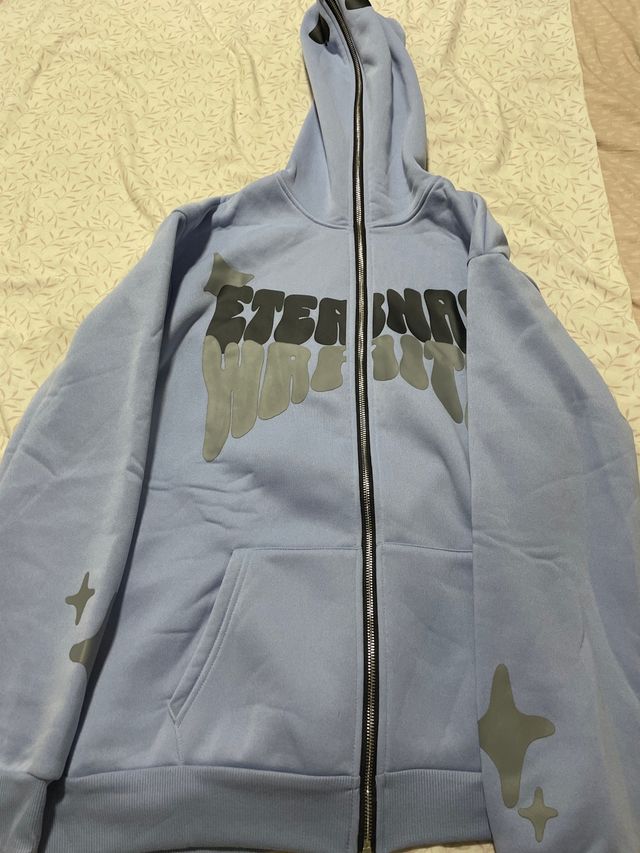 Sudadera azul Eternals con cremallera
