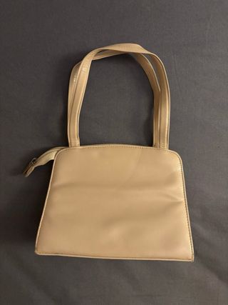 Bolso beige de mano