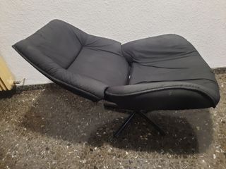 Sillón reclinable negro tela y metal.