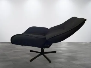 Sillón reclinable negro tela y metal.