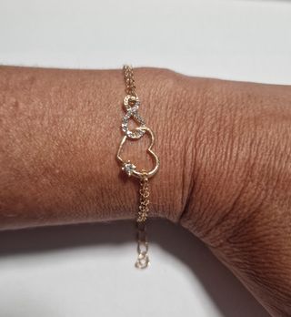 Pulsera doble cadena corazón infinito dorada