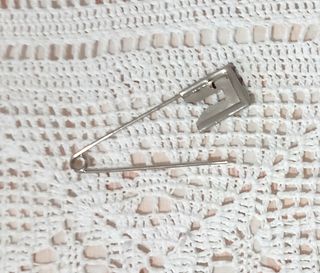 Coprispalle beige lavorato a maglia