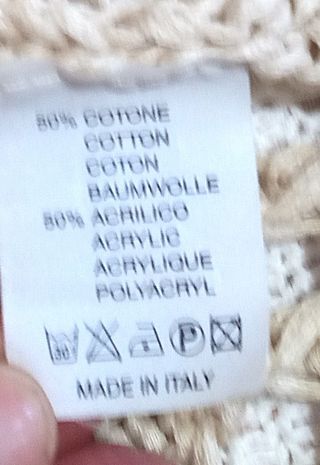 Coprispalle beige lavorato a maglia