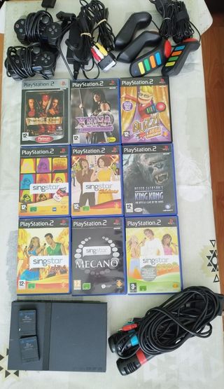 PS2 + 9 juegos + mandos Buzz + mandos singstar
