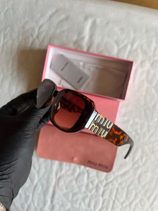 Occhiali Miu Miu - Marrone dorato