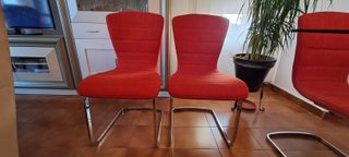 Mesa cristal + 6 sillas rojas