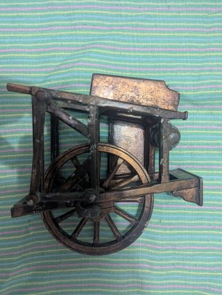 Figura bronce carrito antiguo