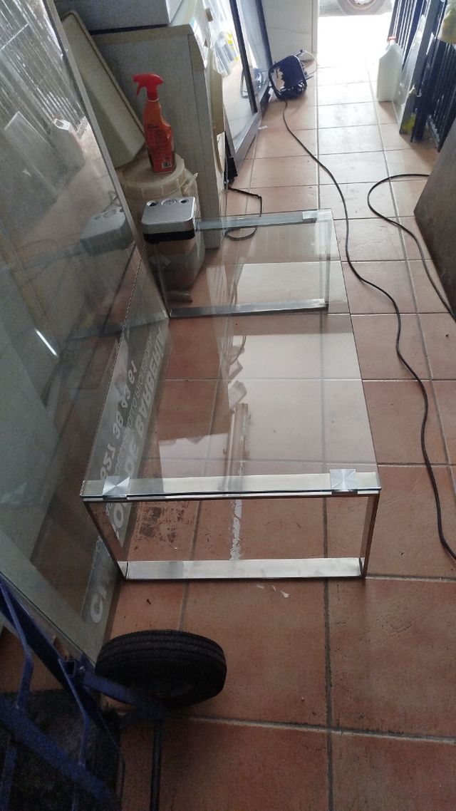 Mesa centro cristal patas de acero inox 110x60x38