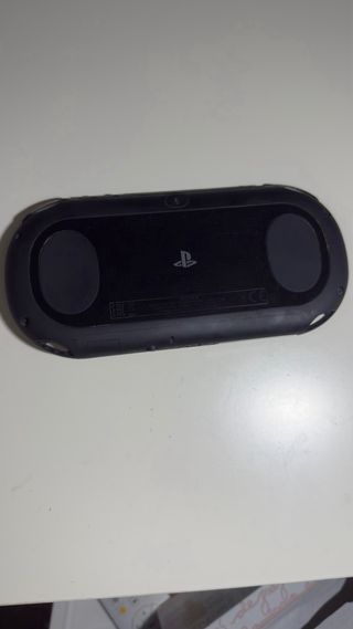 PS Vita (PlayStation Vita) negra y funda azul