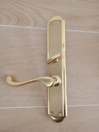 Manillas puerta doradas
