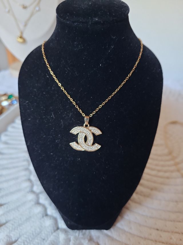 Colgante Chanel dorado acero inoxidable