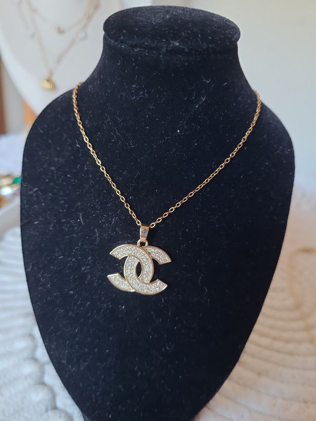 Colgante Chanel dorado acero inoxidable