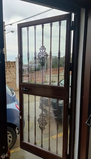 PUERTA ENTRADA O COCHERA HIERRO FORJADO sin marco