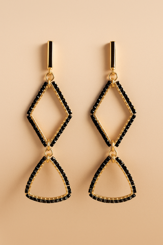 Pendientes geométricos negros y dorados