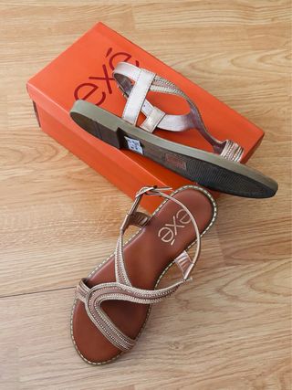 Sandalias exé doradas