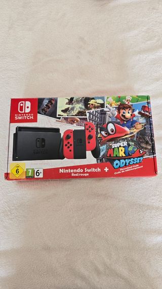Nintendo Switch Roja + Pokemon Let's Go Pikachu 