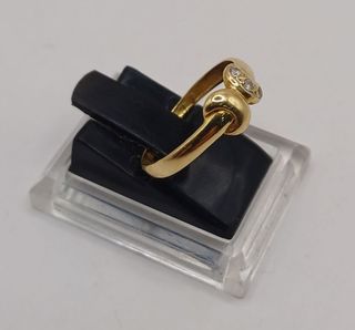 Anillo lunas "x" circ oro 18k, 1,44gr. Ref. G-975.