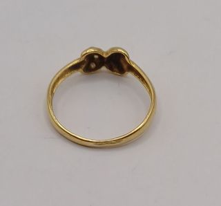 Anillo lunas "x" circ oro 18k, 1,44gr. Ref. G-975.