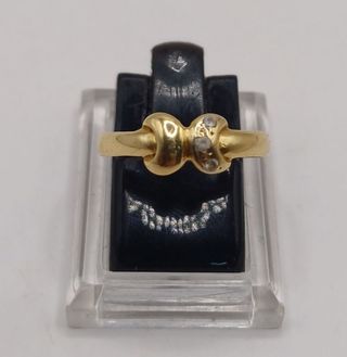 Anillo lunas "x" circ oro 18k, 1,44gr. Ref. G-975.