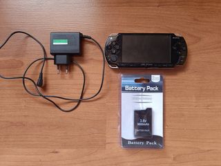 Sony PSP 2004 + cargador + bateria nueva